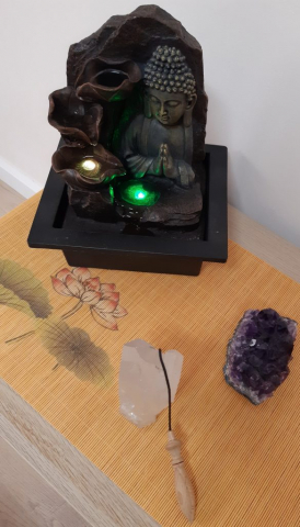 Cristalli, pendolo e buddha